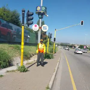 fidelity adt officer standing by the traffic light