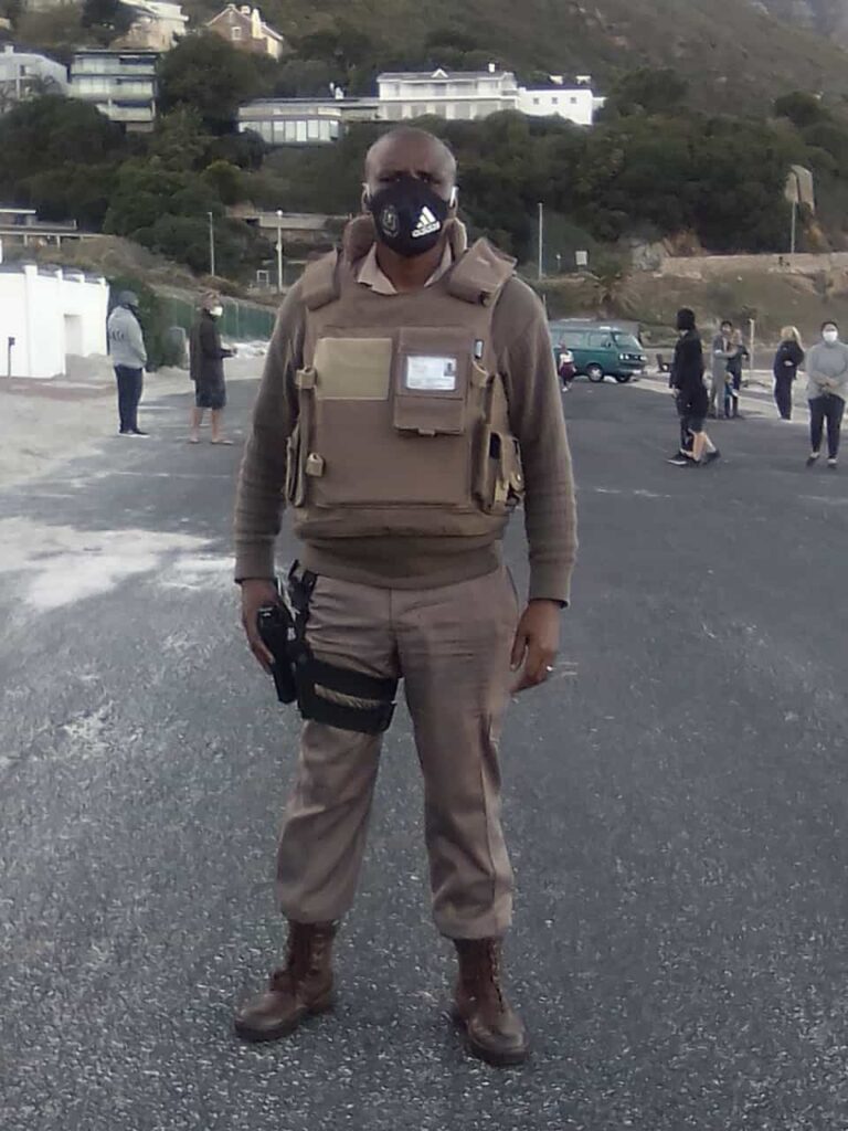armed secuirty guard on the road