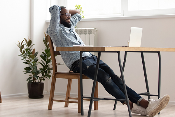 relaxed man sitting on a chair