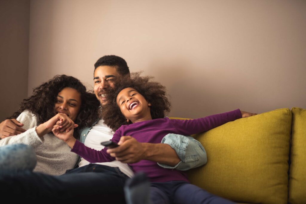 happy dad and mom with kid