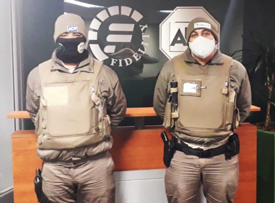 Two security guards with masks