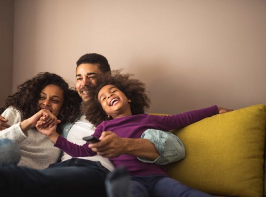 happy dad and mom with kid